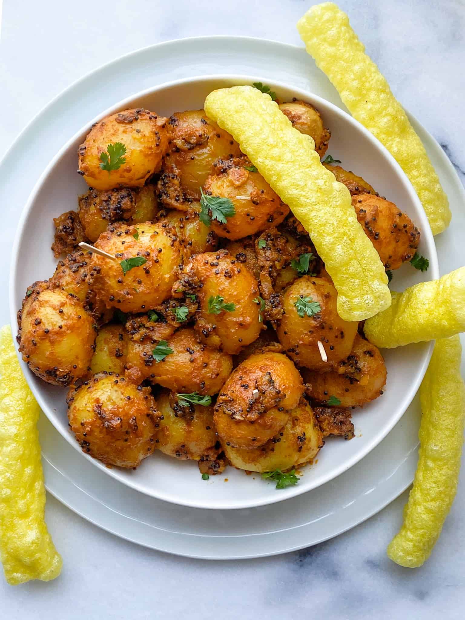 Rai wale Aloo, Masala Potatoes with Indian fryums.