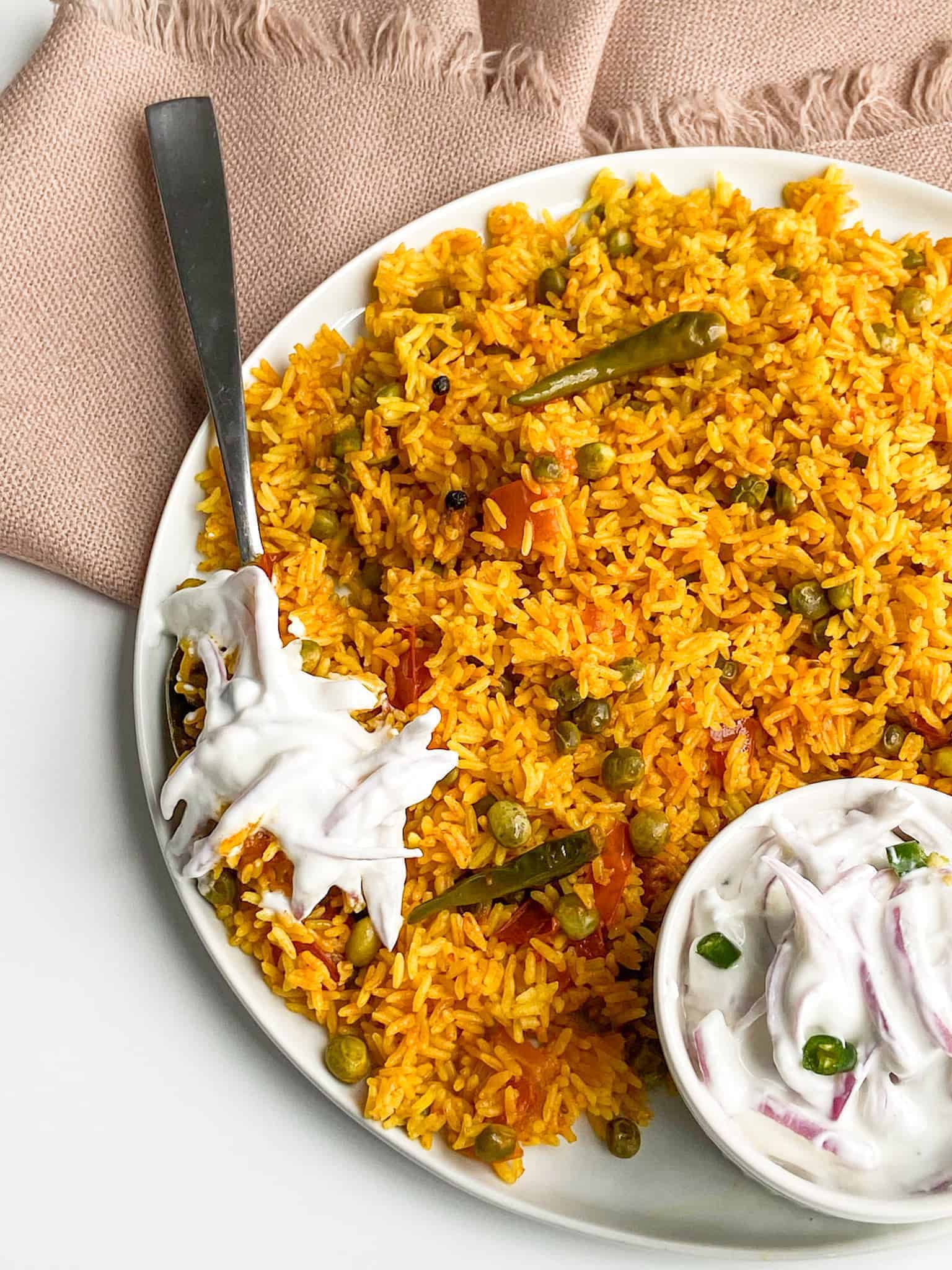 one-pot vegetable spicy rice with yogurt sauce.