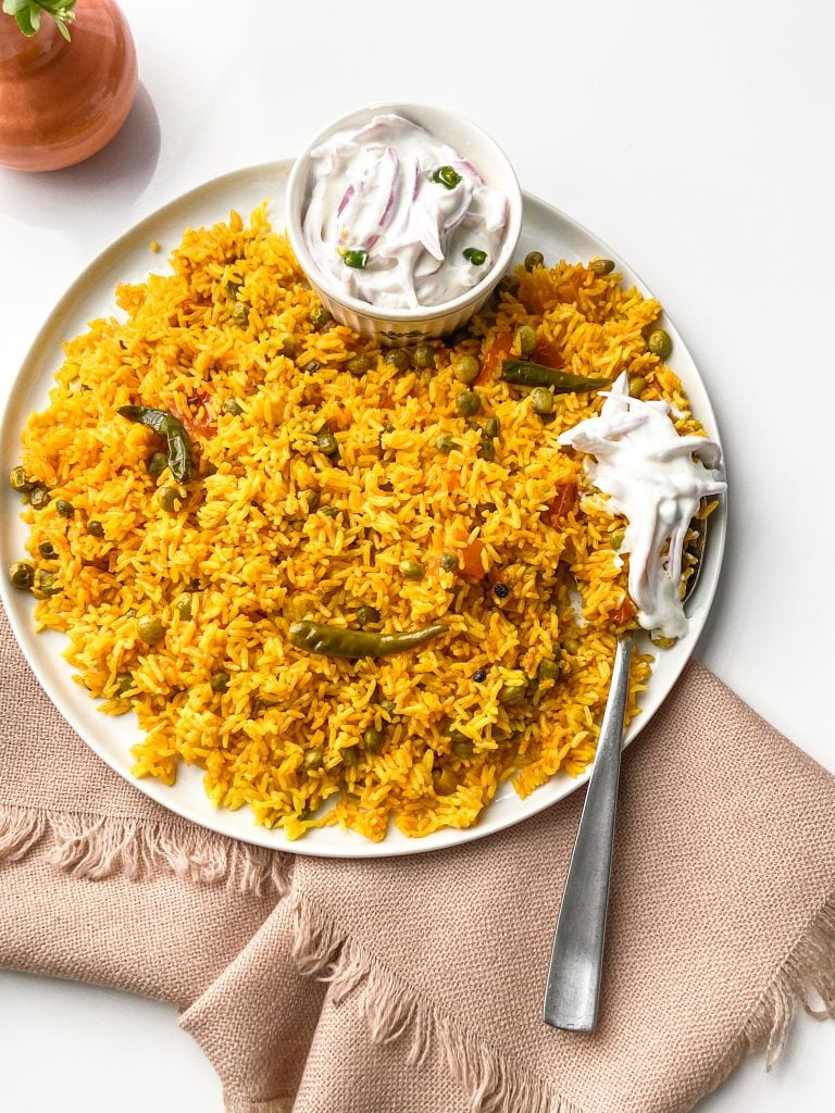 one-pot rice dish with vegetables and Indian spices.