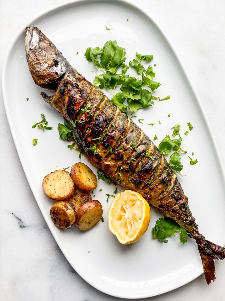 Oven roasted whole mackerel. Oven roasted mackerel with cilantro and garlic. 
