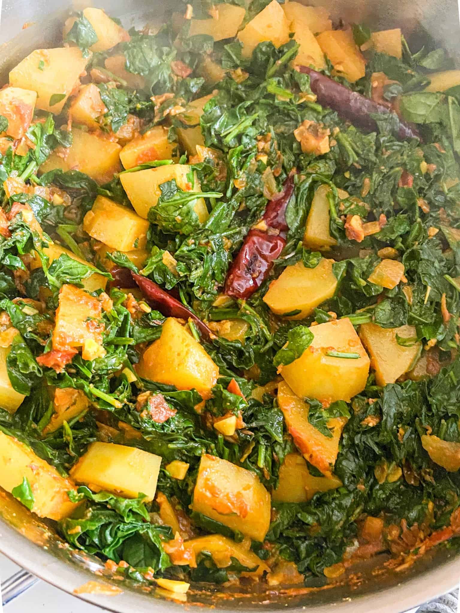 Cover the pan and let the spinach wilt. Aloo palak recipe.