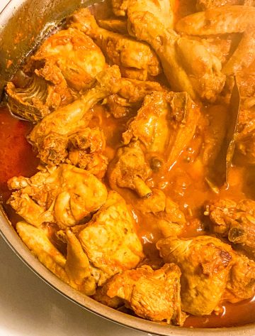cover the pan and cook the chicken curry on low.