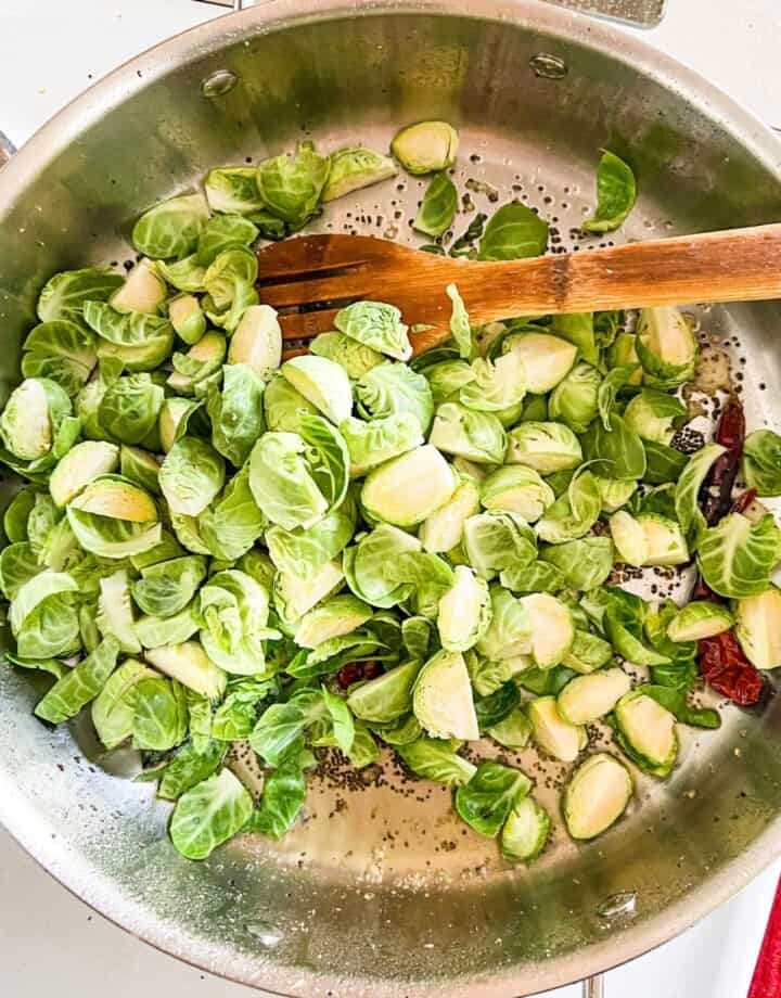 Cook brussels sprouts. 