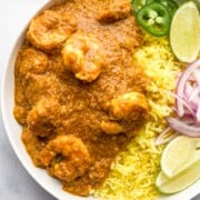 Indian shrimp curry with turmeric rice in a bowl
