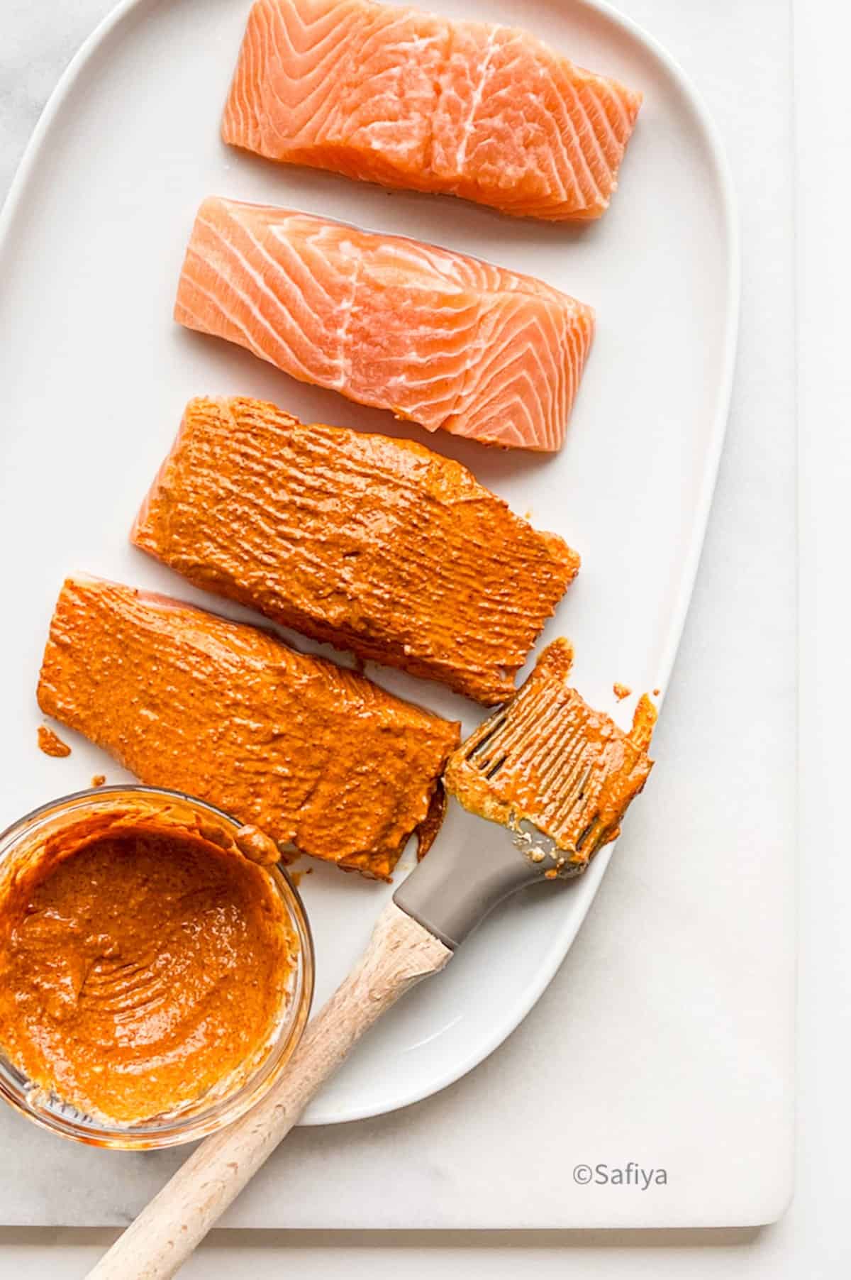 salmon portions brushed with orange marinade