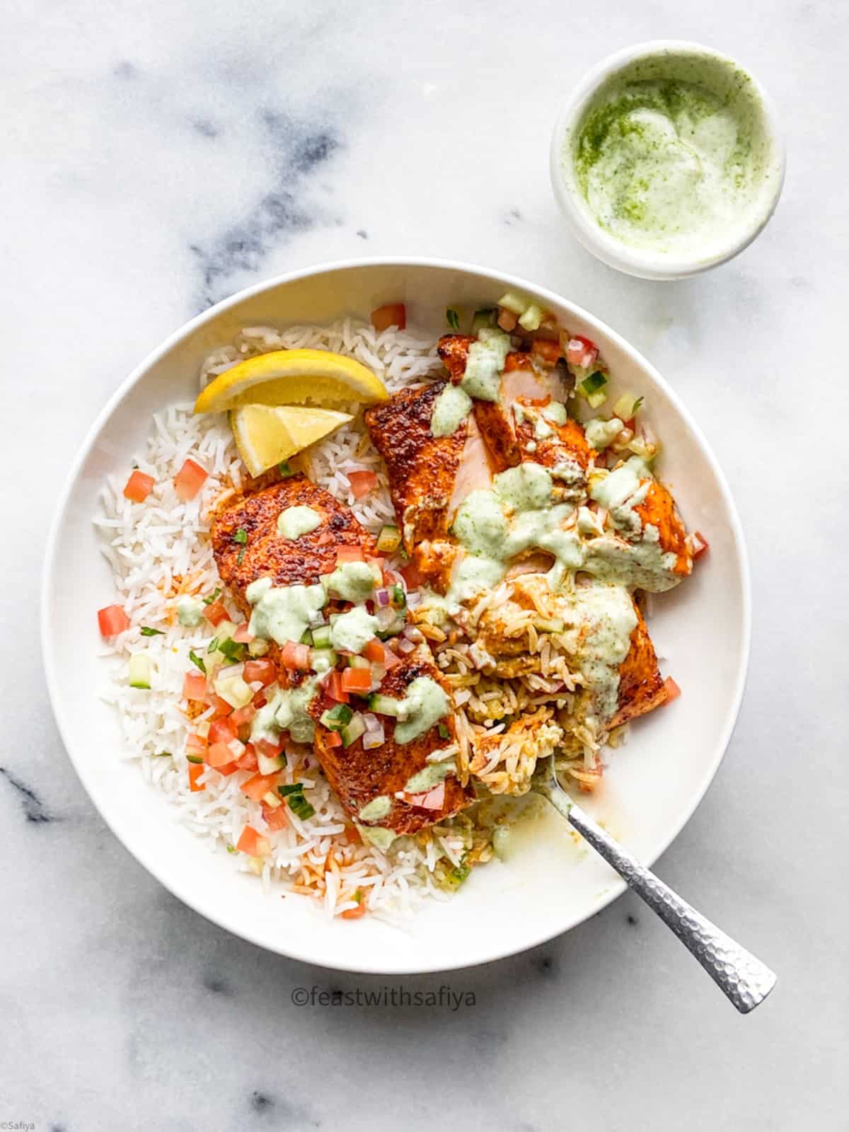 Salmon tikka with rice in a bowl