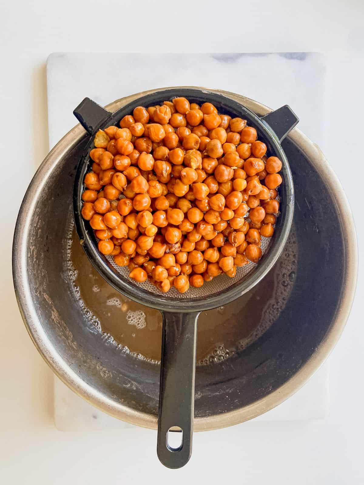boiled black chickpeas in strainer instant pot