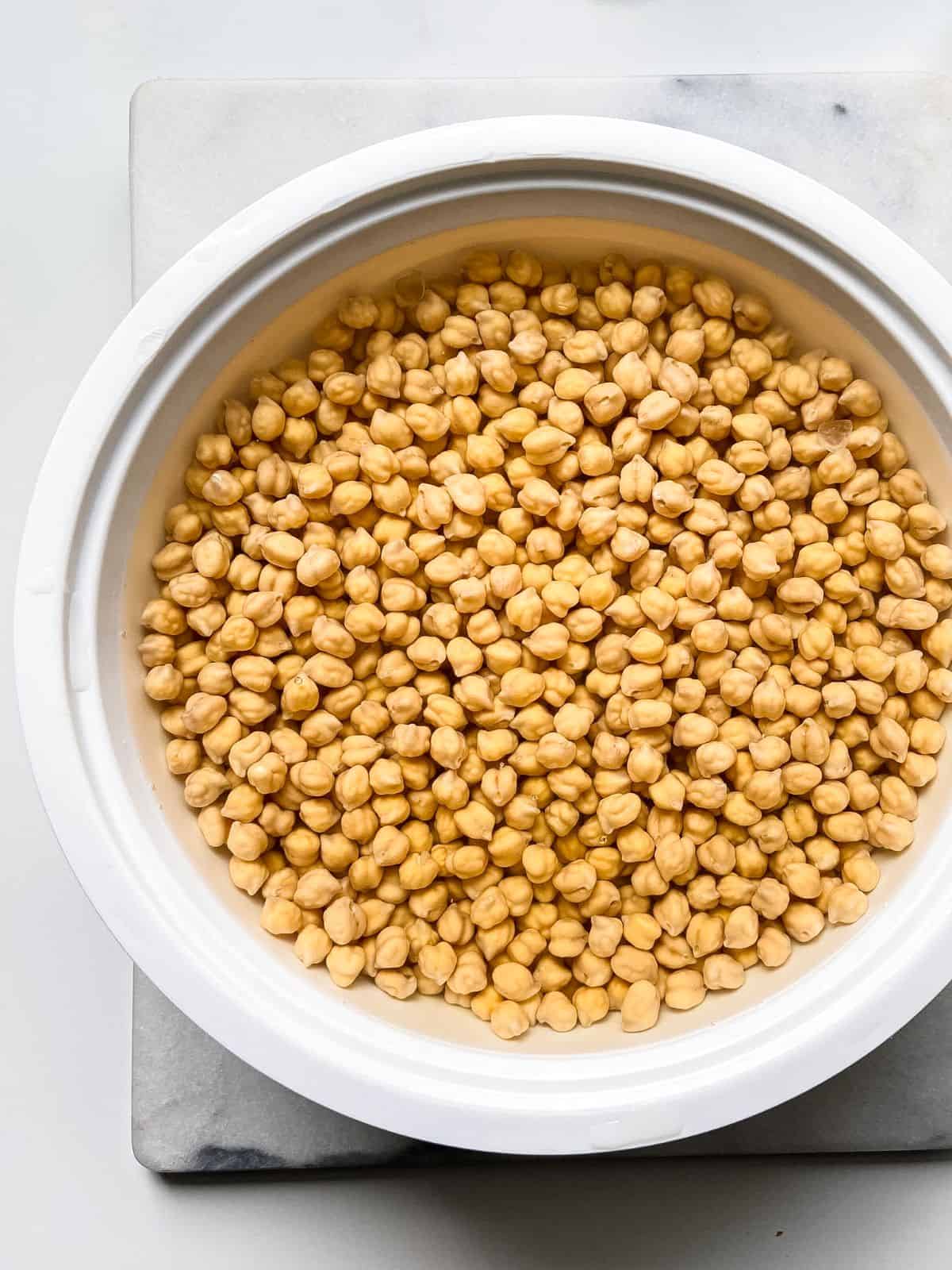 Dried chickpeas soaking in water