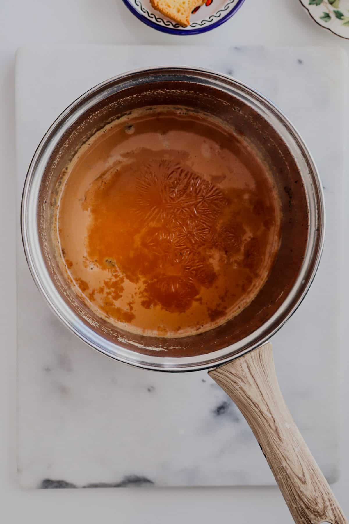 Boiled Masala Chai in a saucepan